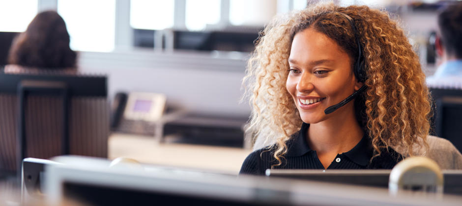 Young Businesswoman Wearing Telephone Headset Talk 2026 01 05 06 30 54 Utc